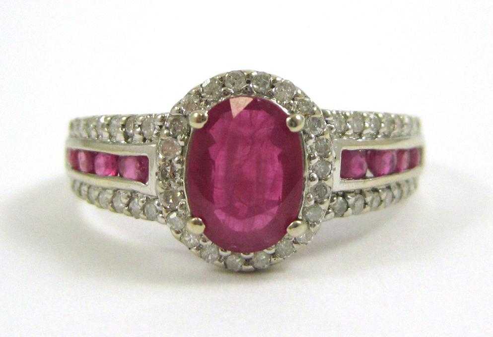 Appraisal: RUBY DIAMOND AND TEN KARAT WHITE GOLD RING with round-cut