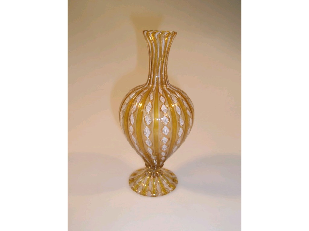 Appraisal: A Salviati style Venetian glass ovoid vase the amber tinted