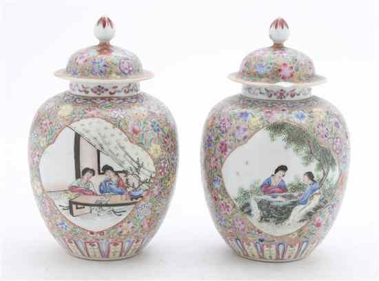 Appraisal: A Pair of Chinese Famille Rose Decorated Lidded Vases of