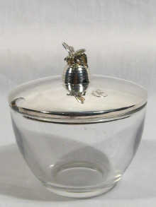 Appraisal: A clear glass honey pot with a hallmarked silver lid