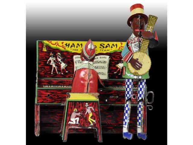 Appraisal: Tin Strauss Ham Sam Toy Band Description Wind-up Working All