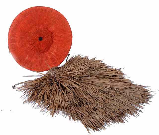 Appraisal: A ZULU HUMAN HAIR CIRCULAR HAT dyed red diameter and