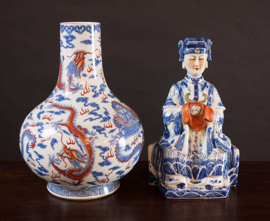 Appraisal: TWO CHINESE PORCELAINS figure of a seated Chinese woman with