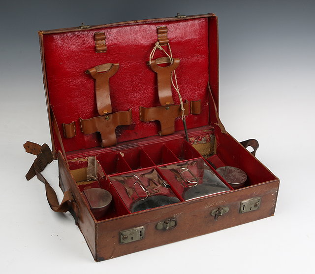 Appraisal: A GENTLEMAN'S LEATHER DRESSING CASE partially fitted and three further