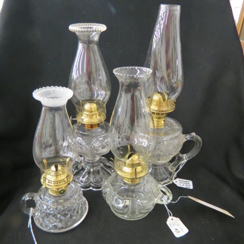 Appraisal: Antique Oil Lamps all with finger ring includes Coolidge Drape