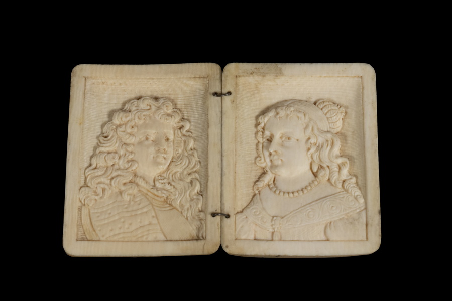 Appraisal: TH C BOOKED IVORY PORTRAITS King Louis XIV and his