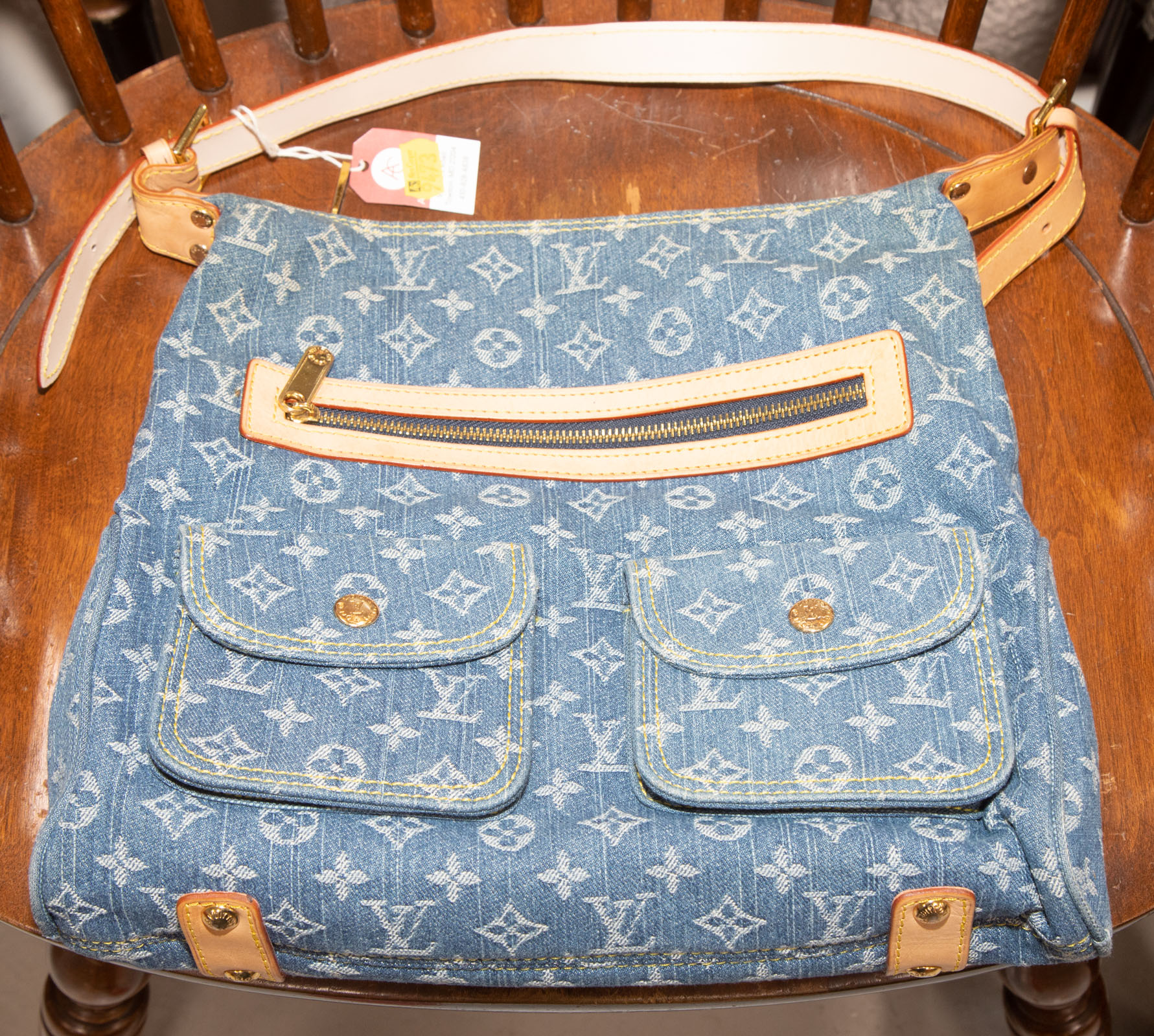 Appraisal: A LOUIS VUITTON INSPIRED HANDBAG A denim monogram Louis Vuitton