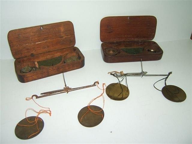 Appraisal: A SET OF TH CENTURY COIN SCALES and weights within