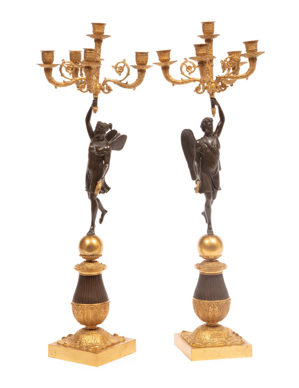 Appraisal: Pair of Empire-Style Patinated and Gilt Bronze Five-Light Figural Candelabra