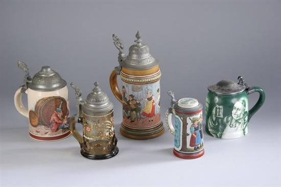 Appraisal: FIVE GERMAN CERAMIC AND GLASS STEINS German Geschutzt pewter-mounted incised