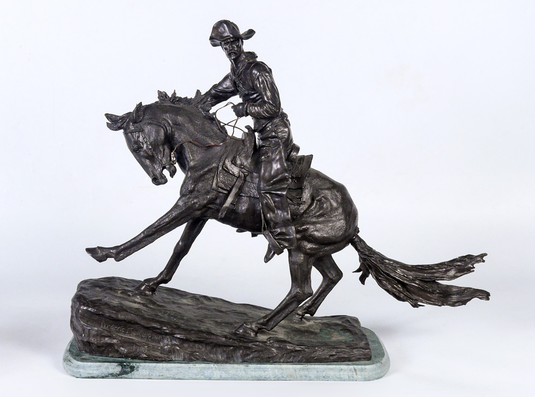 Appraisal: BRONZE COWBOY SCULPTURE AFTER REMINGTON Figure measures ''h x ''