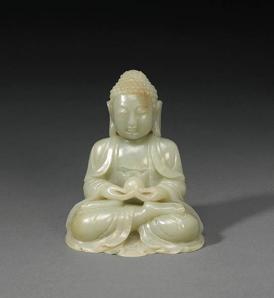 Appraisal: A small greenish-white jade seated figure of Buddha Shown seated