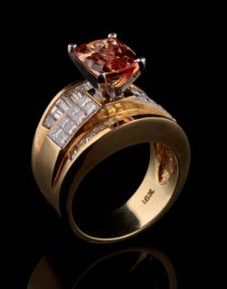 Appraisal: AN K GOLD TOPAZ AND DIAMOND FASHION RING The wide