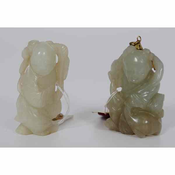 Appraisal: Chinese Jade Pendants Chinese Two celadon jade figural pendants of