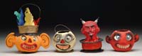 Appraisal: THREE LANTERNS AND DEVIL S HEAD CONTAINER One lantern has