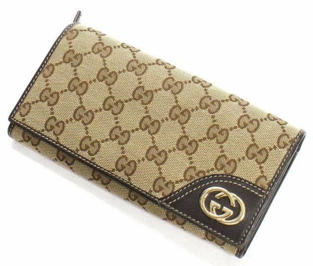 Appraisal: Gucci Britt Continental wallet in brown and beige GG canvas