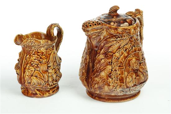 Appraisal: ROCKINGHAM PITCHER AND BEER PITCHER Lidded beer pitcher decorated with