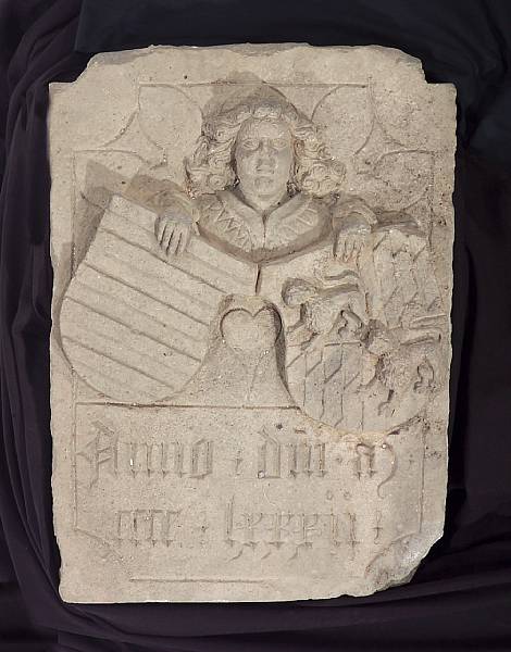 Appraisal: An Italian Renaissance carved limestone armorial plaque dated Carved as