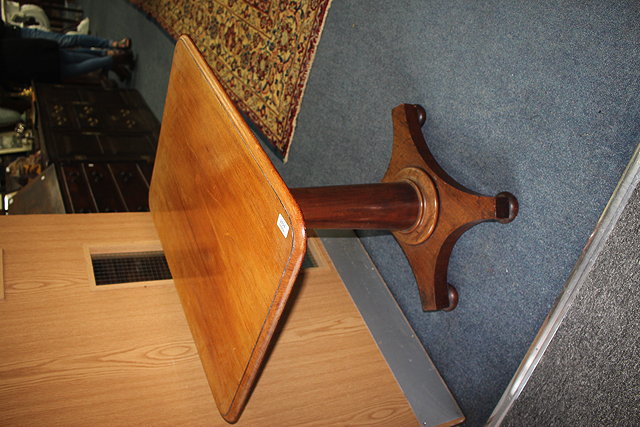 Appraisal: A VICTORIAN MAHOGANY RECTANGULAR TOPPED OCCASIONAL TABLE on turned column