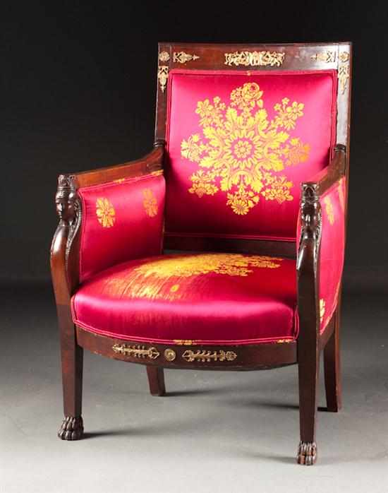 Appraisal: French Empire style mahogany bergere with Egyptian influence th century