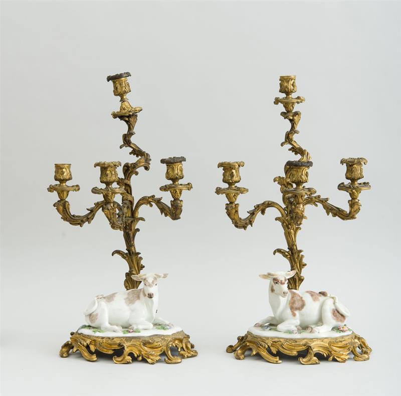 Appraisal: PAIR OF LOUIS XV STYLE GILT-BRONZE FOUR-LIGHT CANDELABRA FITTED WITH