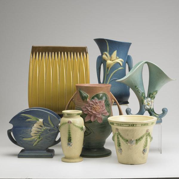 Appraisal: ROSEVILLE Seven vases Lotus blue Zephir Lily blue Freesia blue