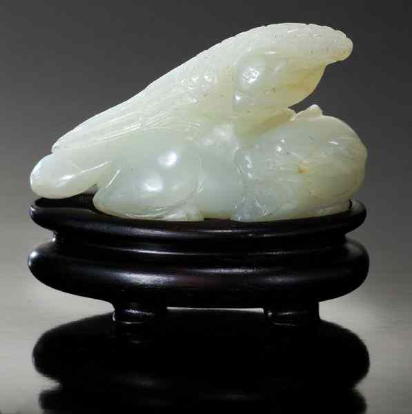 Appraisal: Chinese Qing carved jade toggledepicting an eagle and a bear