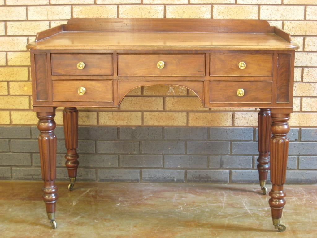 Appraisal: A th Century mahogany Dressing Table with raised gallery fitted