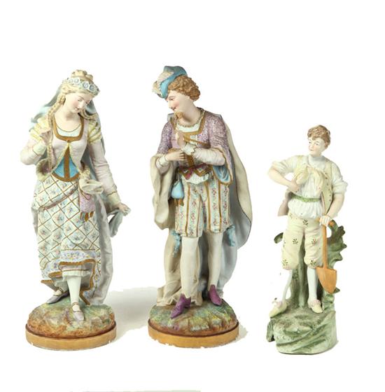 Appraisal: THREE BISQUE FIGURES European early th century Man and woman