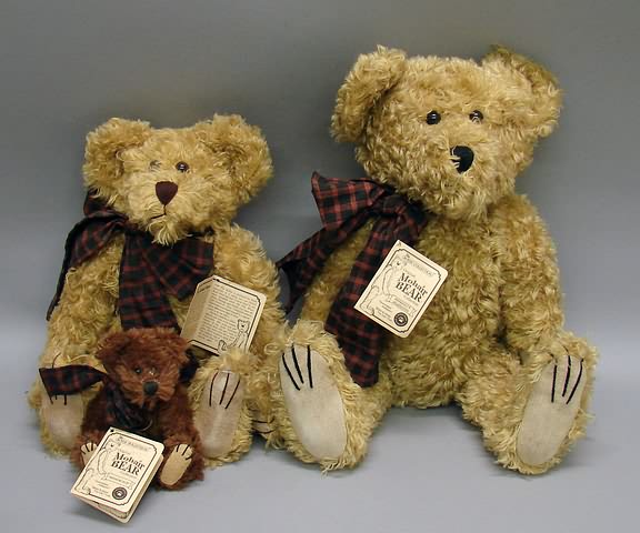 Appraisal: Pair of MIB Boyds matching tan mohair bears Uncle Gus