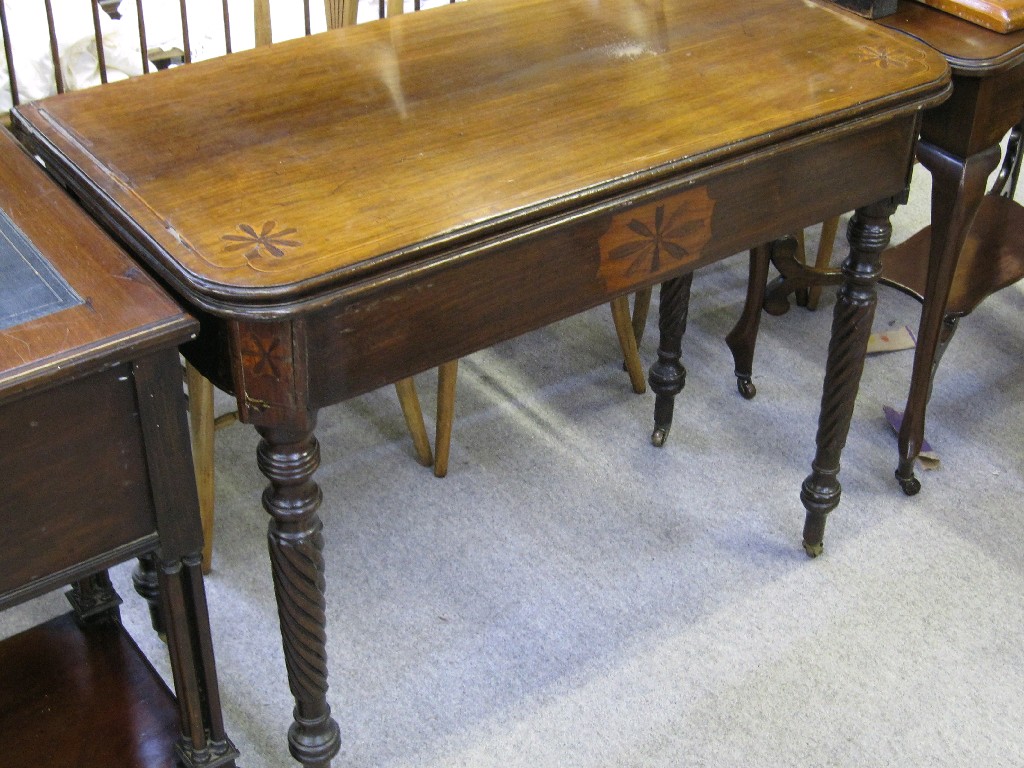 Appraisal: Regency rosewood tea table with inlaid flower motifs upon turned