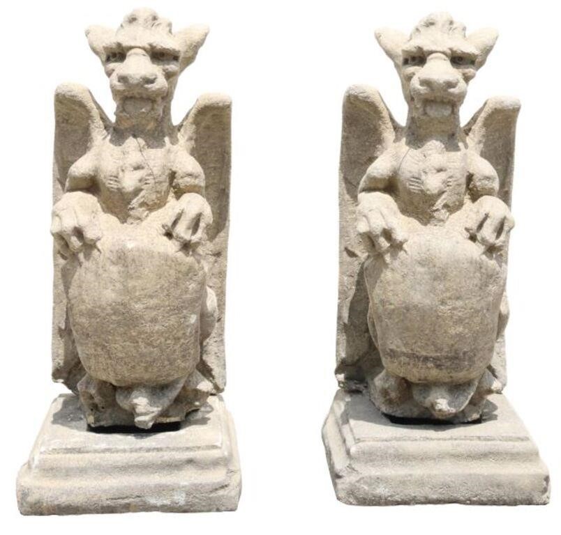 Appraisal: pair Cast stone garden statuary late th c depicting winged