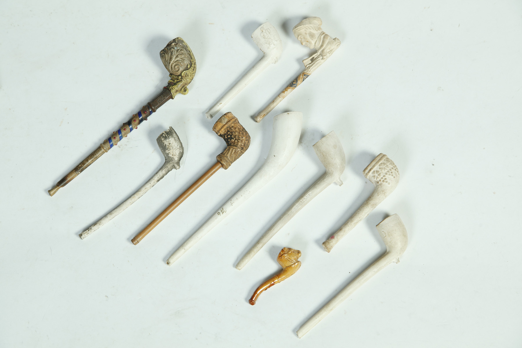 Appraisal: TEN CLAY PIPES Various nationalities and ages Scotland Denmark America