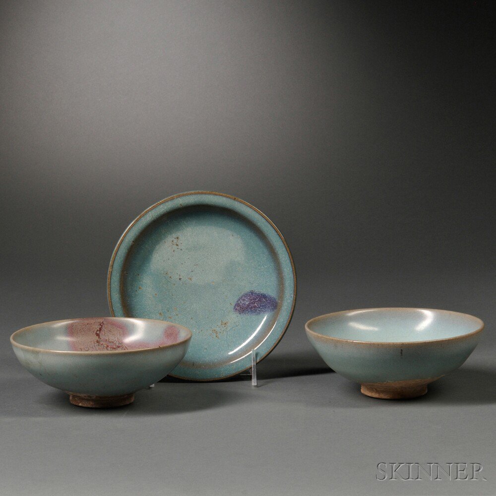 Appraisal: Three Jun Ware Vessels China two gray-blue bowls with pink