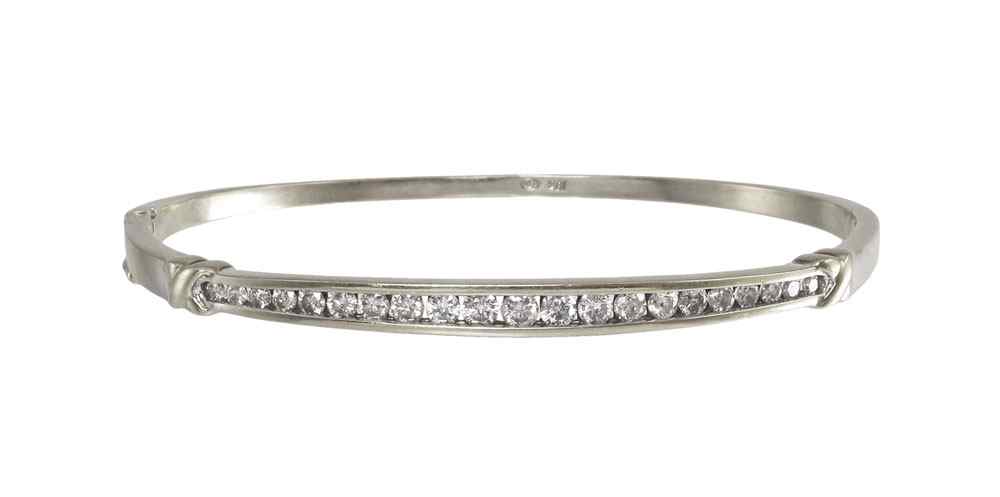 Appraisal: DIAMOND BANGLE BRACELET K white gold bracelet contains round brilliant