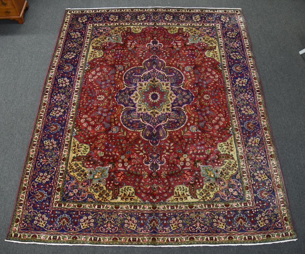 Appraisal: Handwoven Tabriz Carpet Handwoven palace-sized Tabriz carpet with center medallion