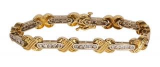 Appraisal: Diamond and k two-tone gold bracelet featuring full cut diamonds