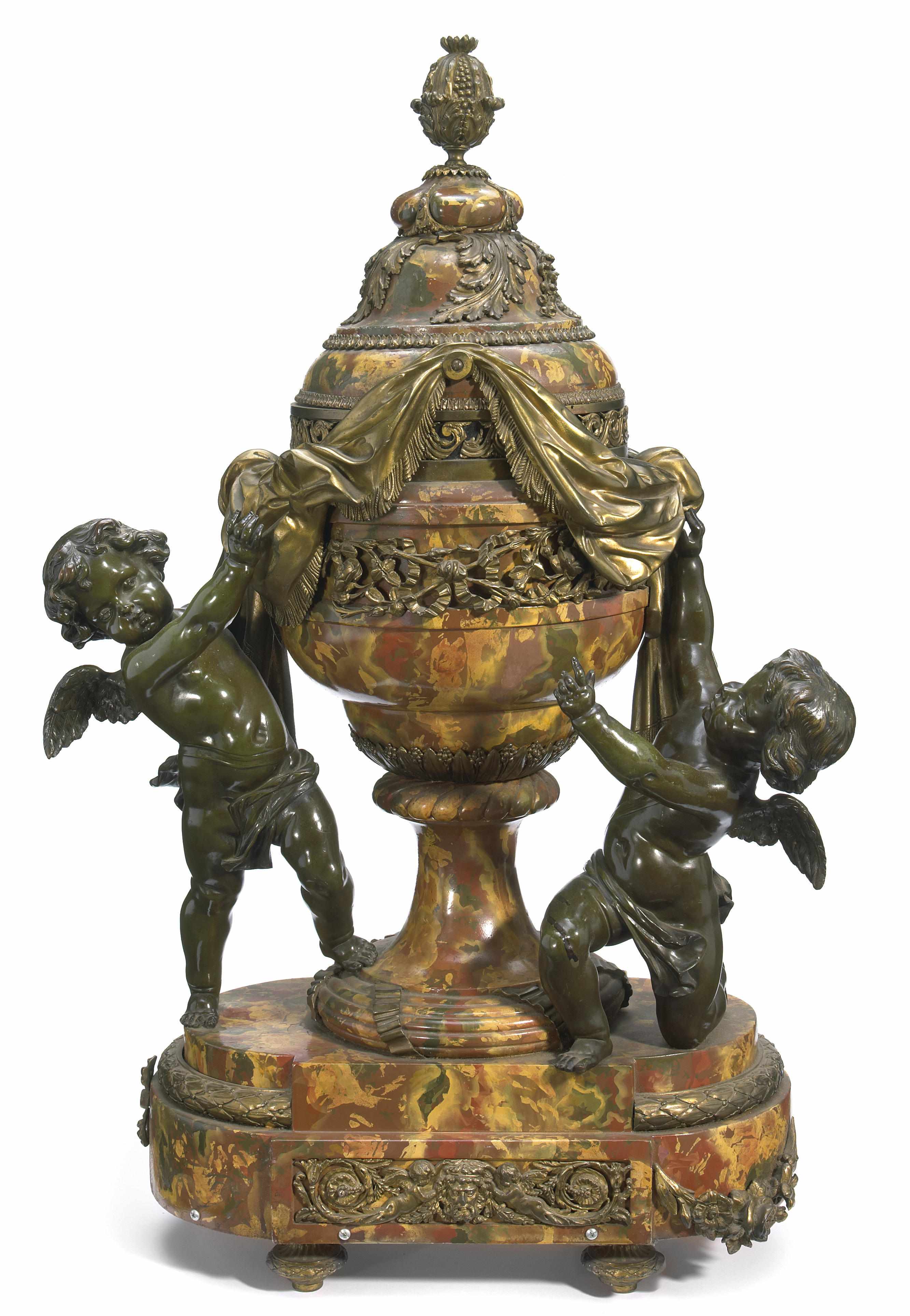 Appraisal: An imposing French gilt and patinated bronze and faux marble