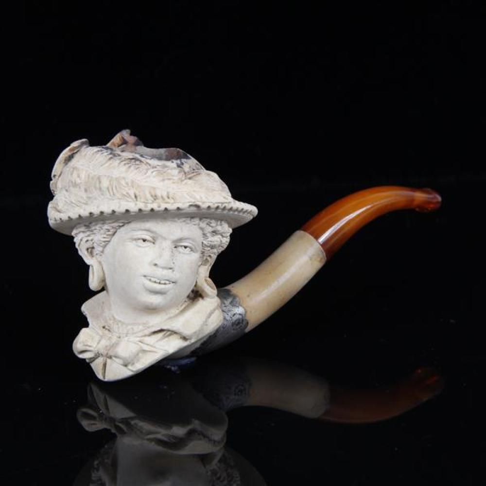 Appraisal: LARGE MEERSCHAUM PIPE WITH AFRICAN FEMALE WITH FEATHERED HAT AND