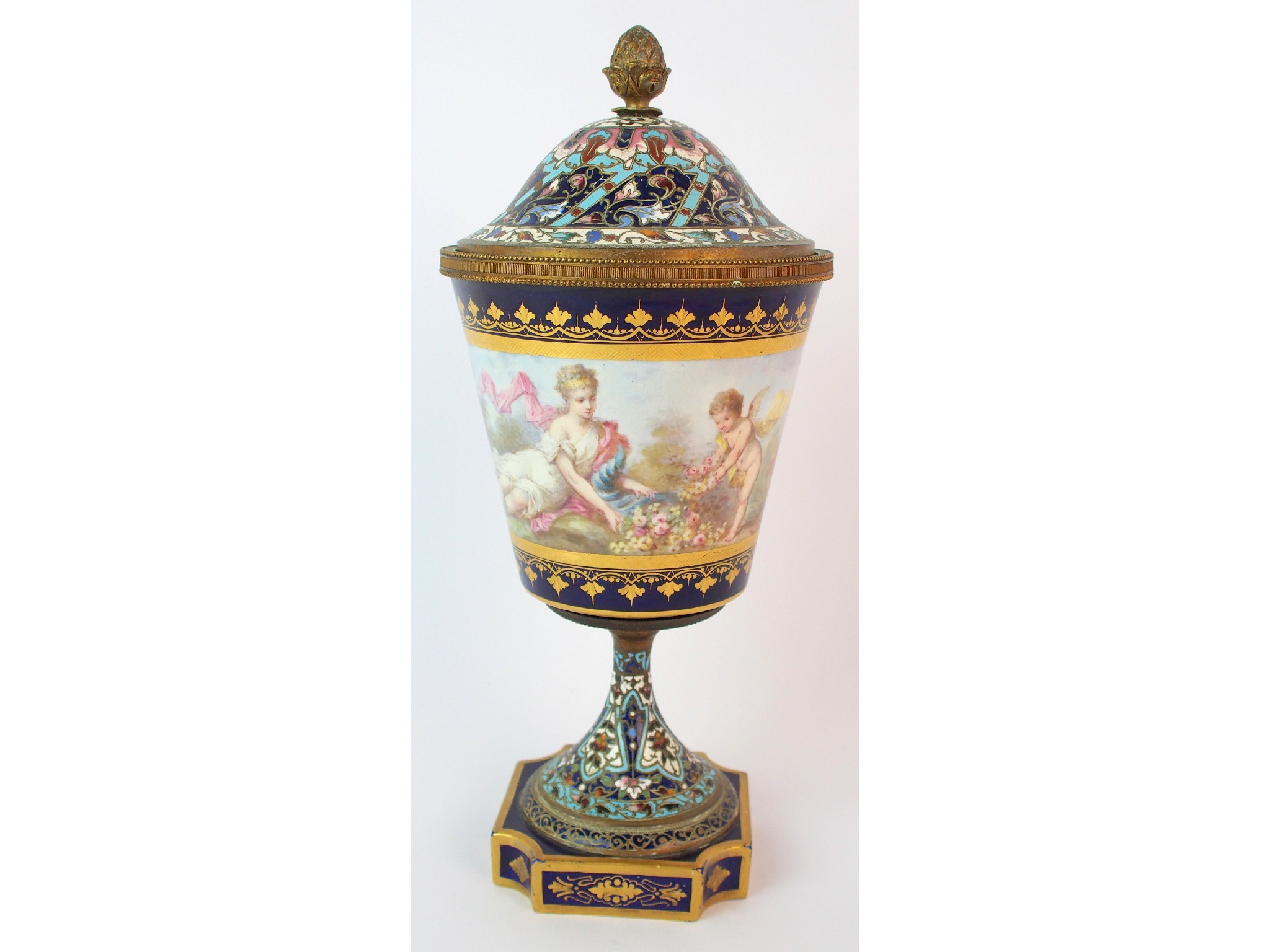 Appraisal: A Sevres pattern and champleve enamel vase and coverpainted with