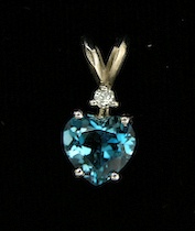 Appraisal: A Pretty Topaz Diamond Pendant k white gold slider pendant