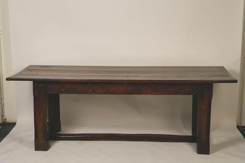 Appraisal: A CHARLES II STYLE OAK REFECTORY TABLE with a plank