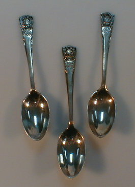 Appraisal: Three commemorative silver teaspoons commemorating the reign of George V