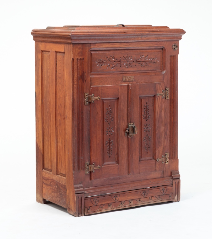 Appraisal: Late th century oak Hinged lidded ice well with embossed