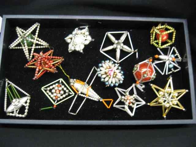 Appraisal: Czechoslovakian Glass Christmas Ornaments fancy red beadwork including butterfly stars