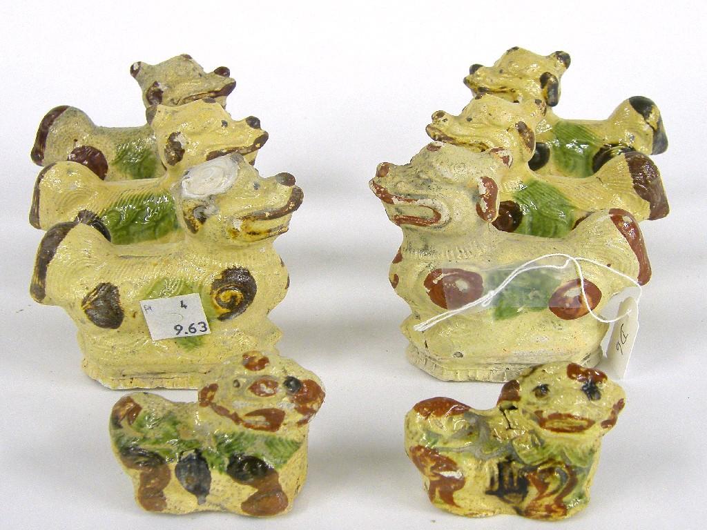 Appraisal: Eight glazed Diana Cargo Buddhistic lion toys and high circa