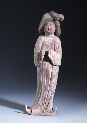 Appraisal: A large Chinese pottery model of a matron with flowing