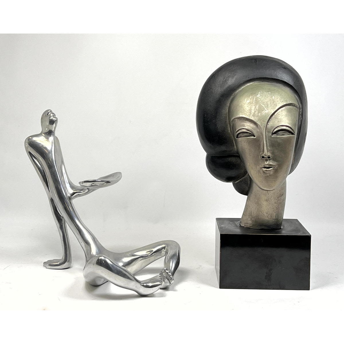 Appraisal: pc Modernist Metal Figural Sculptures Lady head bust with silvered