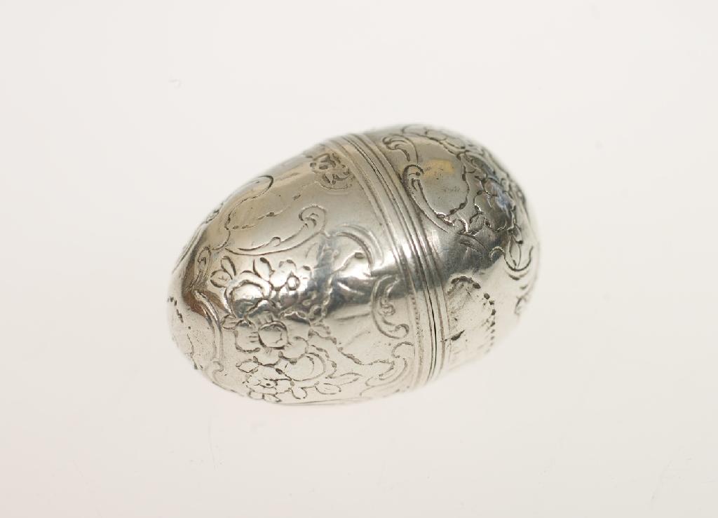 Appraisal: GEORGE III EGG-SHAPED NUTMEG GRATER apparently unmarked with engraved floral