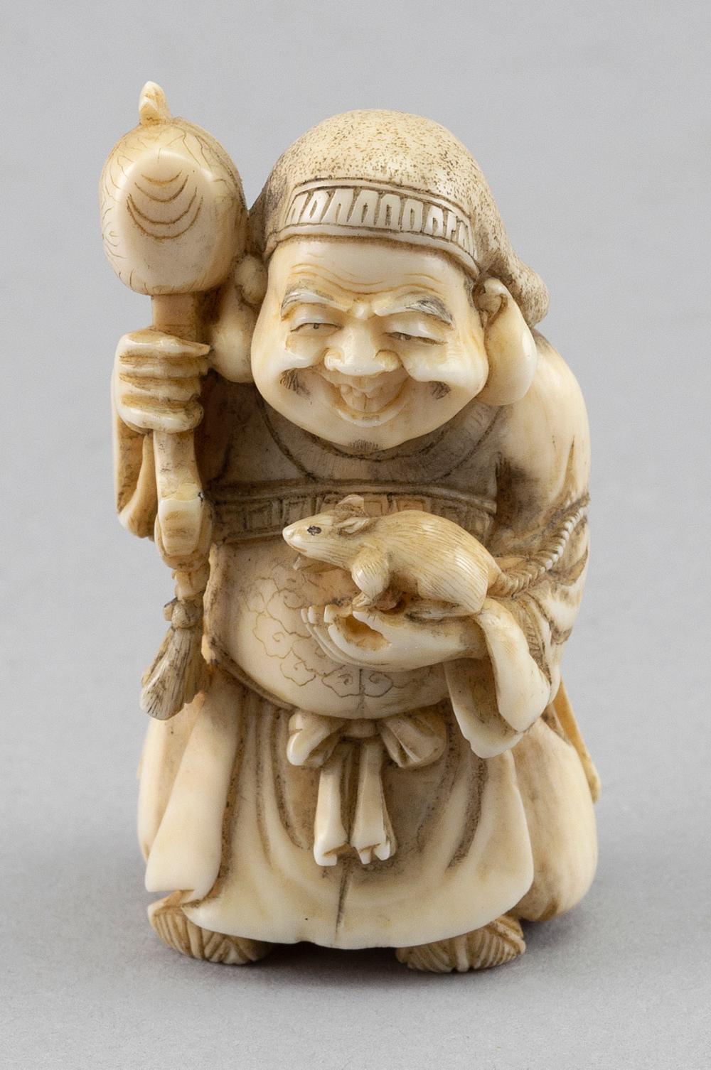 Appraisal: JAPANESE IVORY NETSUKE BY GUYOKUSAI TH CENTURY HEIGHT JAPANESE IVORY